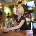 Isalita bartender Billi Bowman serves up a drink to a patron at the bar in downtown Ann Arbor.  Melanie Maxwell I AnnArbor.com